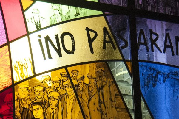 A stained glass window in Belfast, Ireland, with the phrase "No Pasaran!"